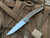 Hog House Knives Model T Bronzed Titanium Body w/ Light Blue Anodized Titanium Hardware and Blasted RWL-34 Blade (3.36”) HHK-T-BR-BZLBL