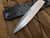 Defiant7 Les George M320 Fixed Blade Black G10 Handle and Titanium Guard w/ N690 Plain Edge Blade (