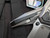 Arcane Design The Creature Folder Stonewashed Titanium Body w/ Black Pivot Collar and Stonewashed Tanto Plain Edge Blade (3.75")