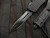 Microtech Combat Troodon Delta Shadow D/E Shadow Black Delta Pattern Aluminum Body w/ DLC Fluted Full Serrated Blade (3.8") 142-3CT-DSH
