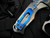 Medford Knives Praetorian Genesis T Folder Tumbled Deep Cut "Laurel Leaf Filigree" Lasered Titanium Body w/ Blue Hardware/Clip and S35VN Tumbled Drop Point Blade (3.3")