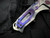 Medford Knives Praetorian Genesis T Folder Tumbled Deep Cut "Laurel Leaf Filigree" Lasered Titanium Body w/ Violet Hardware/Clip and S35VN Tumbled Drop Point Blade (3.3")