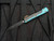 CONSIGNMENT Microtech Ultratech D/E ICCE Show Exclusive Edition Turquoise/Black Body and Dark Orange Hardware w/ Elmax black Plain Edge Blade (3.2") 122-1 ICCE