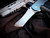 CONSIGNMENT Grimsmo Norseman Folder Blue to Ice Blue Fade and Violet Accents Reverse Honeycomb Pattern Titanium Body w/ CPM 154 Stonewashed Plain Edge Blade