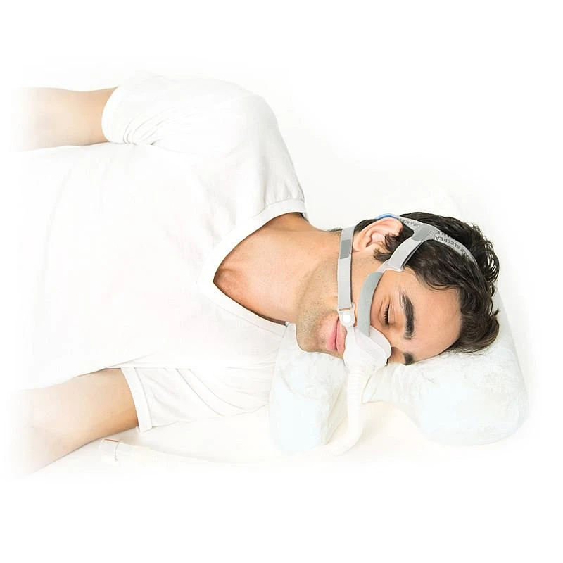 Best in Rest CPAP Memory Foam Pillowcase, man sleeping peacefully with CPAP mask on, relaxing sleep aid accessory.