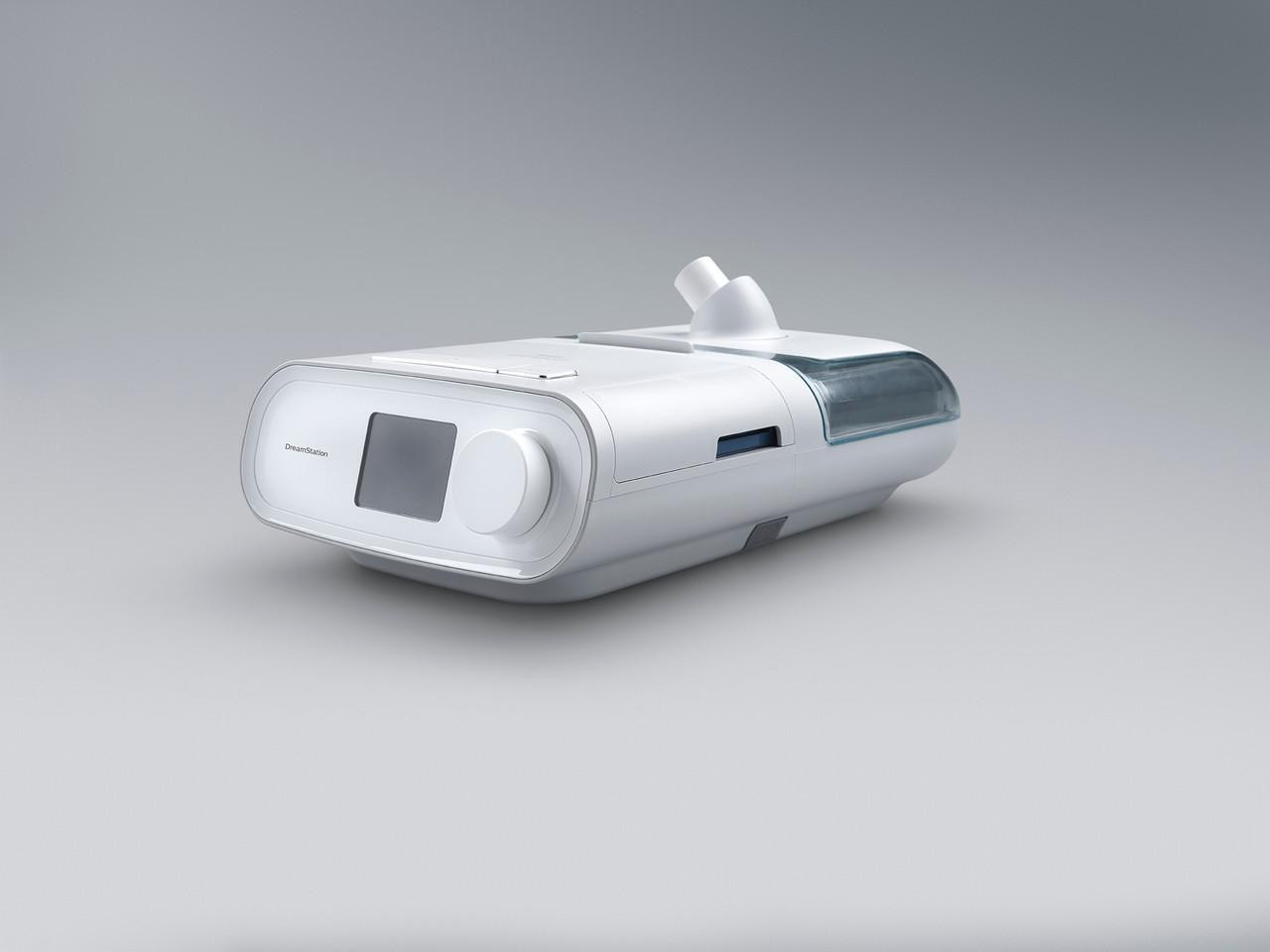 Philips Respironics Philips DreamStation Pro Mask CPAP Package, a medical device used for sleep apnea therapy, with a sleek white design and a transparent water chamber.