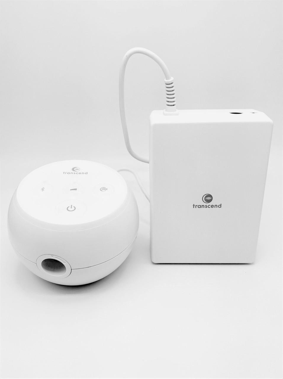 Transcend Micro Auto, compact white device with control buttons and a connected power supply unit.