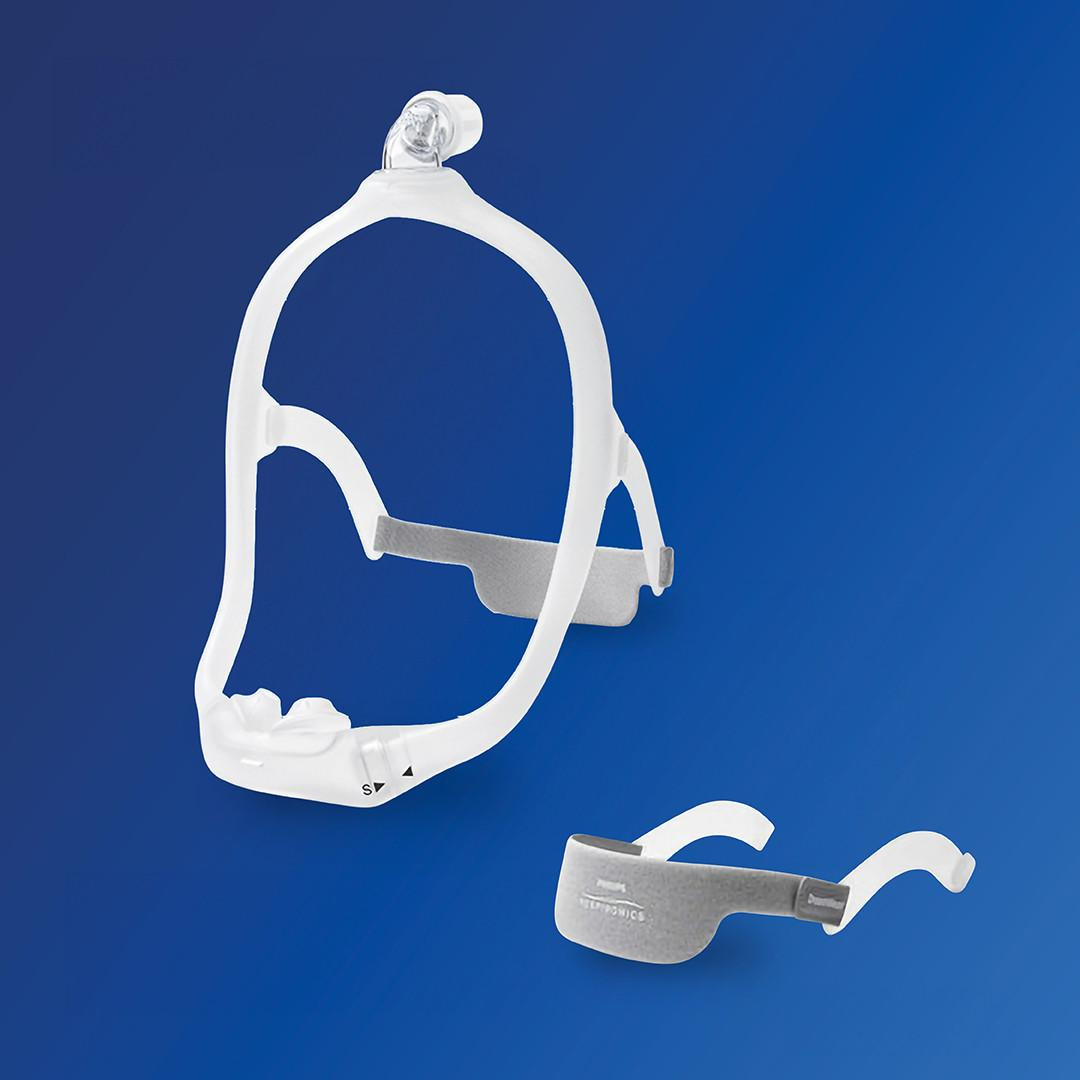 Philips Respironics DreamWear CPAP Masks, a complete set of sleep apnea therapy mask components including headgear and nasal cushion, on a blue background.