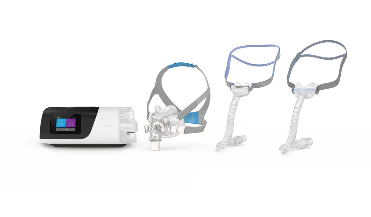 Resmed Airsense 11 Auto and Mask Package, including the sleek white and black CPAP machine with digital display, and multiple masks with adjustable straps and flexible tubing for sleep therapy.