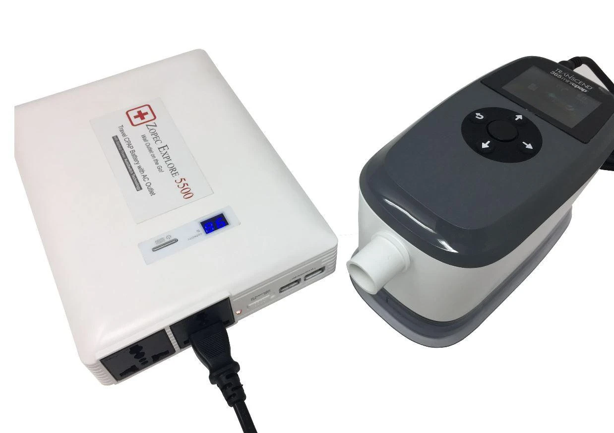 Zopec Explore 5500, portable medical oxygen concentrator device with control panel and connected tubing.