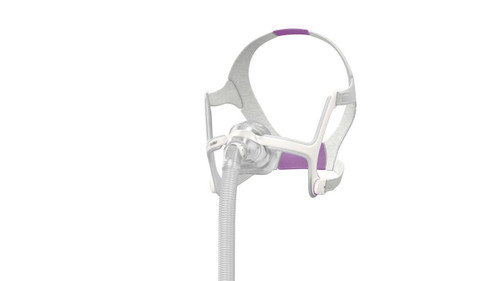 ResMed AirTouch N20 For Her, a wearable CPAP mask with a soft, pink and white design and adjustable headgear for comfortable sleep therapy.