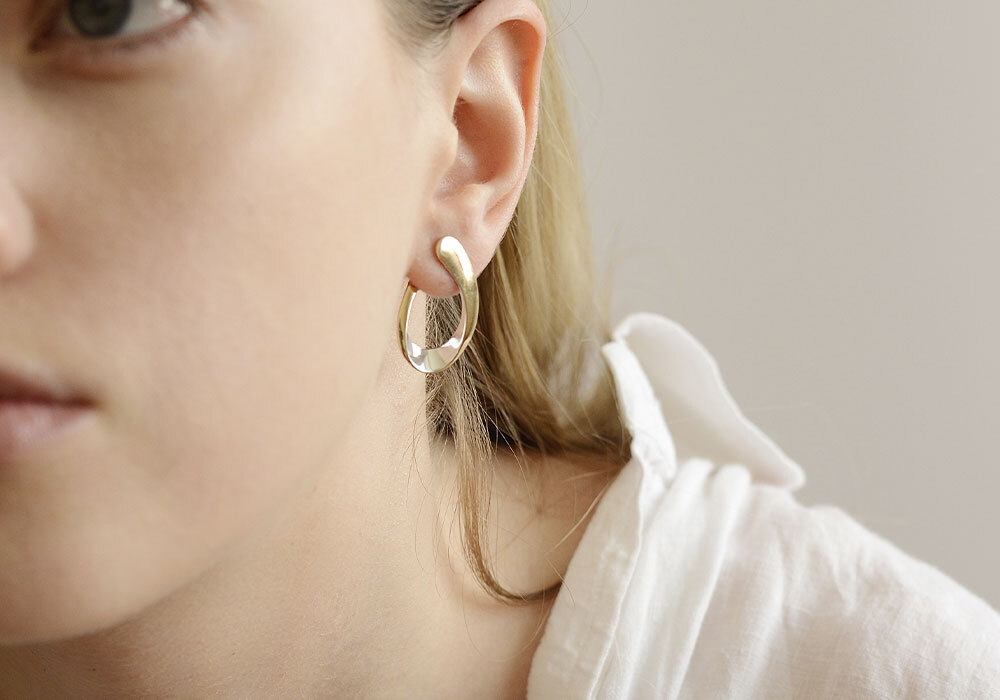 Perforación del lóbulo en Farmacia Porta de la mar, en Valencia