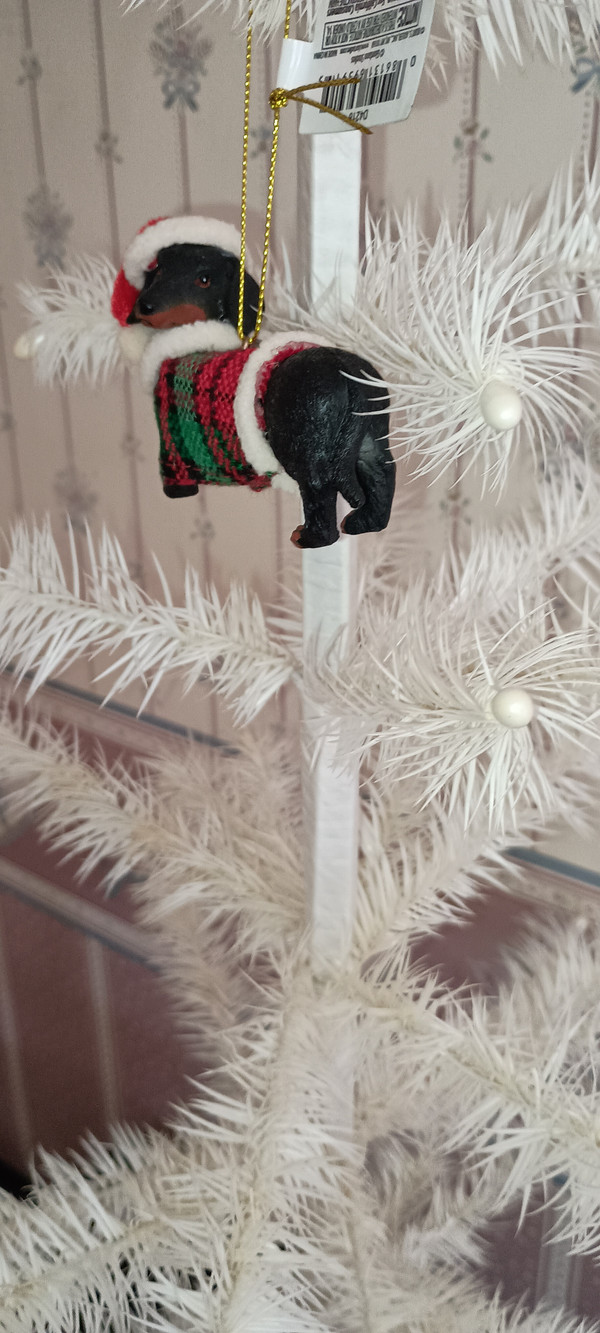 KURT ADLER-2023- PET PARADE DOG ORNAMENT-BLACK & TAN DACHSHUND ORNAMENT WITH PLAID COAT & SANTA HATY