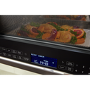 Four à micro-ondes à convection et hotte intégrée KitchenAid® avec mode de friture à air YKMHC319LBS