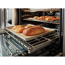 Cuisinière commerciale intelligente bicombustible KitchenAid® avec plaque chauffante, 48 po KFDC558JSC