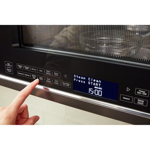 Four à micro-ondes à convection et hotte intégrée KitchenAid® avec mode de friture à air YKMHC319LBS