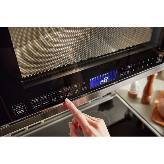 Four à micro-ondes à convection et hotte intégrée  avec mode de friture à air KitchenAid® YKMHC319LPS