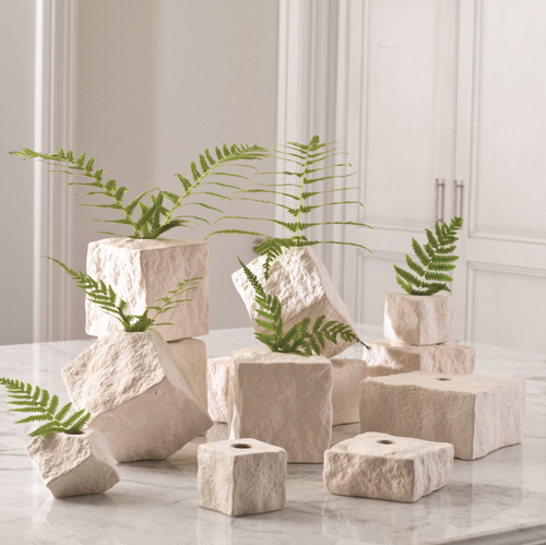 These watertight vases are made of ceramic to resemble cut stone blocks. They can be stacked, clustered, massed out or used individually. Use them for buds, twigs, or greenery; they also add texture and form as sculptural pieces.
