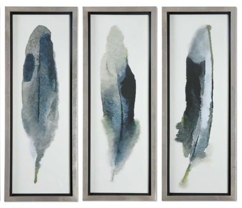 Dark blue and black hues against an off-white background create a striking contrast in these contemporary feather prints. These on-trend printed colors appear in a watercolor style. Each print is accented by a champagne silver frame with a black satin inner lip. Each print is placed under protective glass.
