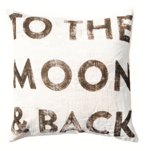 This accent pillow is great for a living room, bedroom or even a nursery or child's room. It features a white background with the phrase "To the moon and back" printed in black.