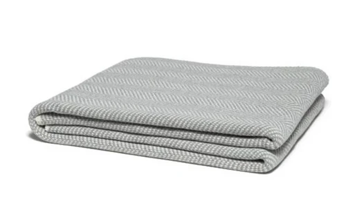 Herringbones have always been a favorite of the chic, outdoorsy types. Whether it's hunting, fly-fishing, or horseback riding, the herringbone motif has donned blazers and trousers for years. This Eco Herringbone Throw is yet another emblem of the great outdoors, both in function and aesthetic. Add this blanket to any favorite living or sleep space.  