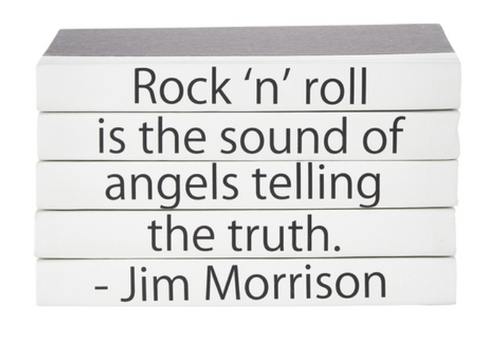 "Rock n Roll is the Sound of Angels Telling the Truth" quote on decorative hardbound/repurposed books.