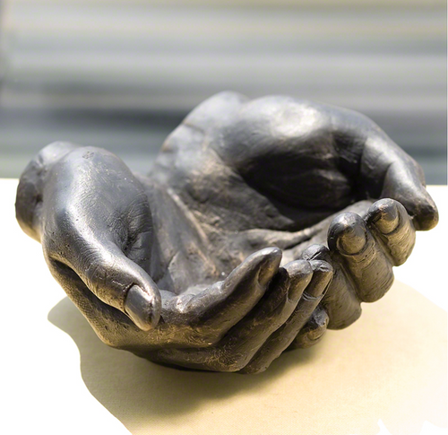 Iron hand bowl is a great place to drop your keys or prized possessions, or empty as a sculptural accent piece.