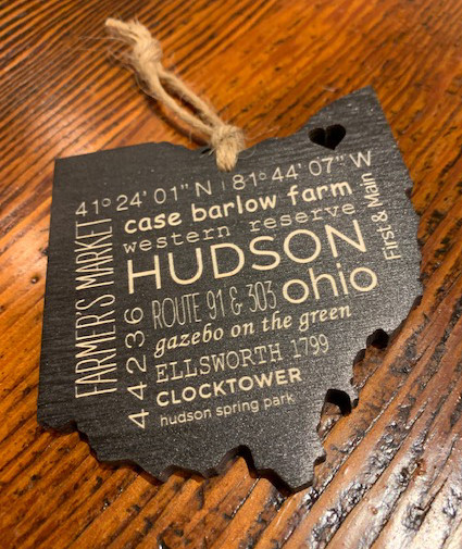 Quality:  Born and Made in the USA.   FCS certified and 100% recycled wood source.  

Sustainable:  We make them strong (1/4" thick) so that they can be re-used forever.   Made with sustainable inks and a UV coating,  as well as,  an eco-friendly lacquer that covers the entire ornament to permanently protect the wood.   

Care:  Washable with soap and water.