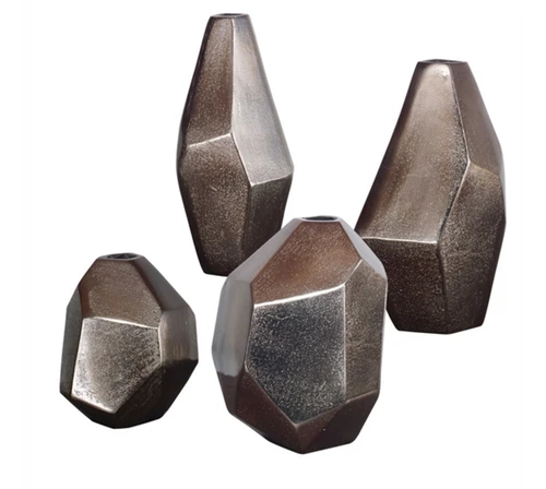 Set of four, textured cast aluminum, geometric vases feature a bronze finish. Sizes: Sm-4x4x4, Med-4x6x4, Lg-3x7x3, XL-3x7x3