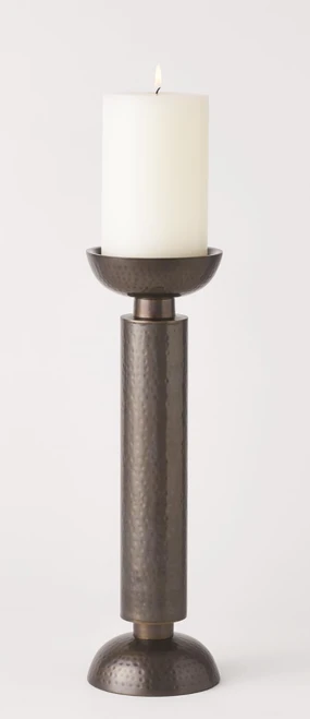 These towering candlesticks are made from hand hammered, bronze plated iron sheet. Each holds a 4 inch pillar candle