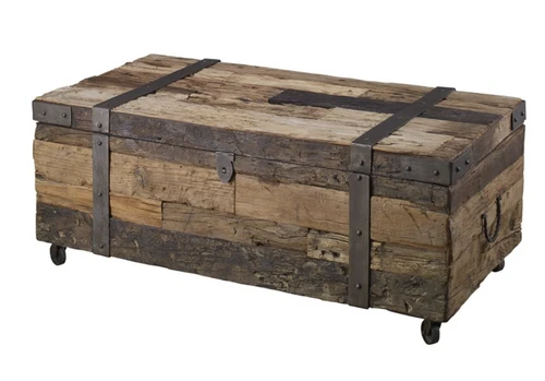 A rustic, yet functional rolling coffee table, featuring character rich reclaimed wood in a natural stain with riveted iron strap accents in an aged metal finish. True to the nature of salvaged wood, this piece will show rustic signs of past usage. Solid wood will continue to move with temperature and humidity changes, which can result in small cracks and uneven surfaces, adding to its authenticity and character.