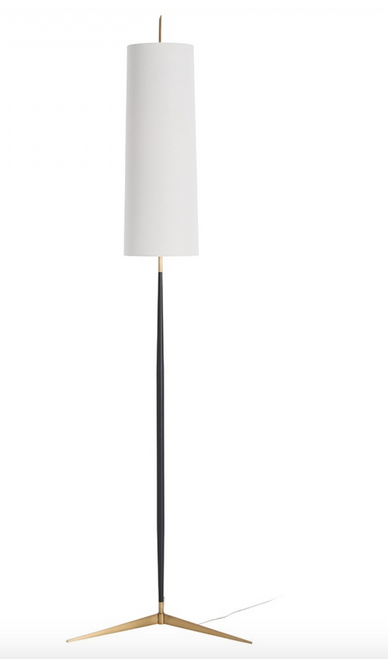 The Lamp's bronze, slender steel body and singular off-white shade make quite a statement under the guise of simplicity. With its combination of bronze and antique brass, this floor lamp is vintage-inspired high style. Topped with a tall off-whitelinen drum shade that is lined to match.
