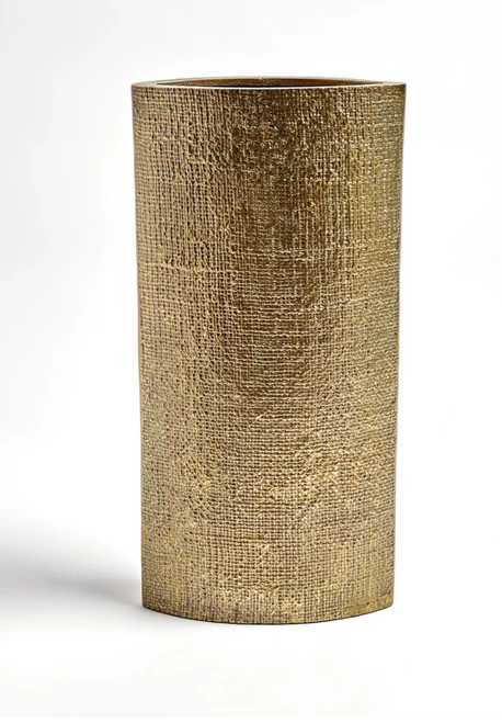 The organic, hemp-like texture of these watertight vases is hand-etched into an aluminum sheet, forming the body of the brass finished vases.