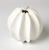 This chic vase is an easy way to layer the home with texture. Ceramic construction with matte white finish.