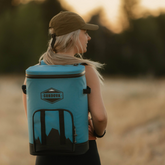 Lightweight cooler backpack being comfortably worn by female hiker