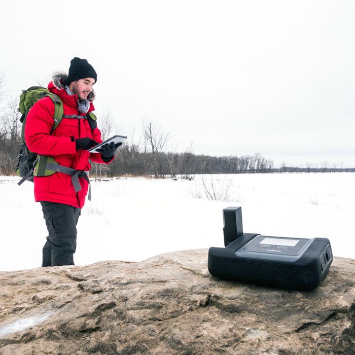Man using a satellite solution in the winter, iridium go!