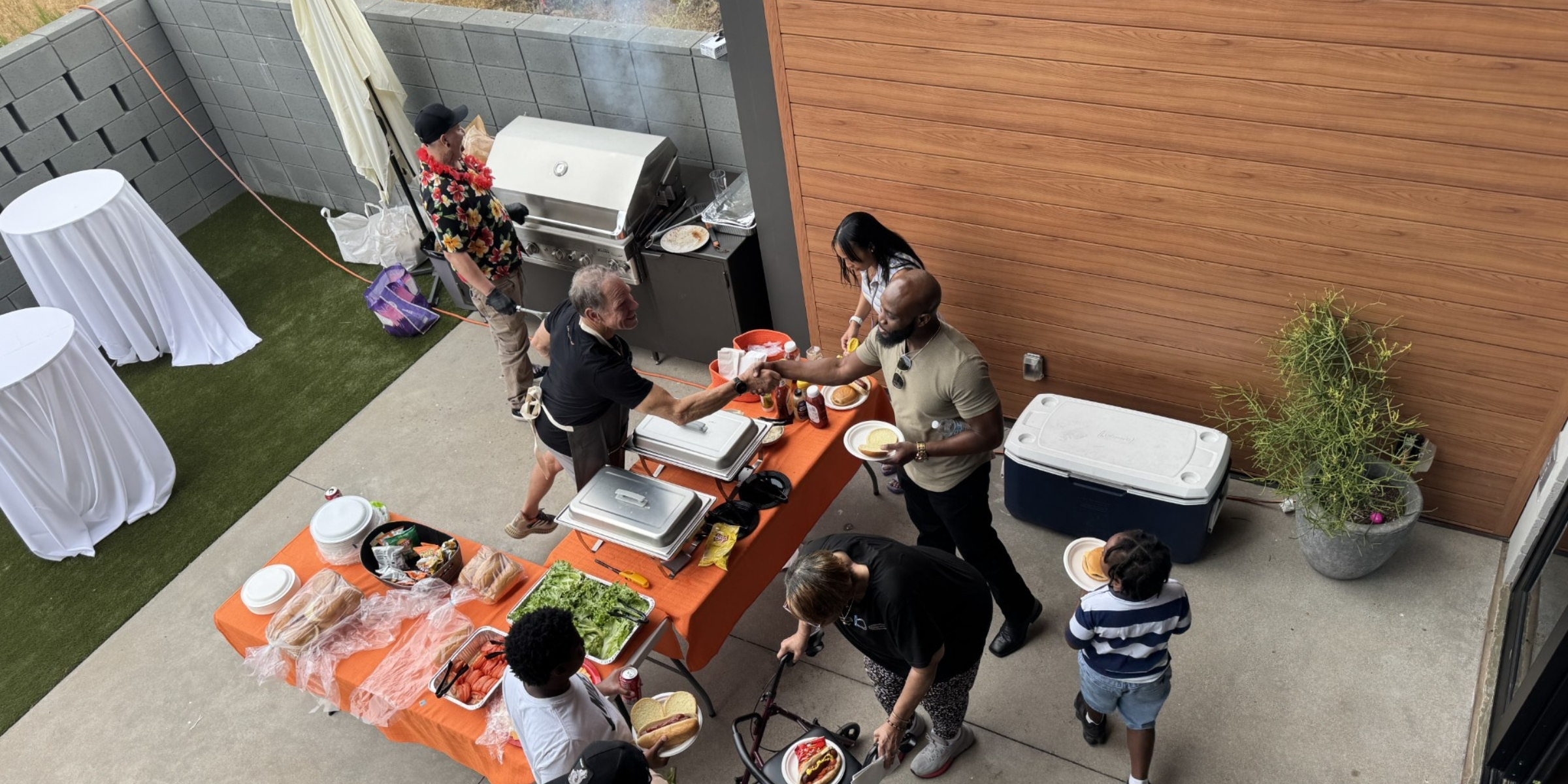 Juggernaut team barbecue with hotdogs and hamburgers
