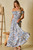 Elegant paisley off-shoulder maxi dress for women with a flowy design and soft fabric, ideal for warm weather, resort wear, and effortless boho style looks.