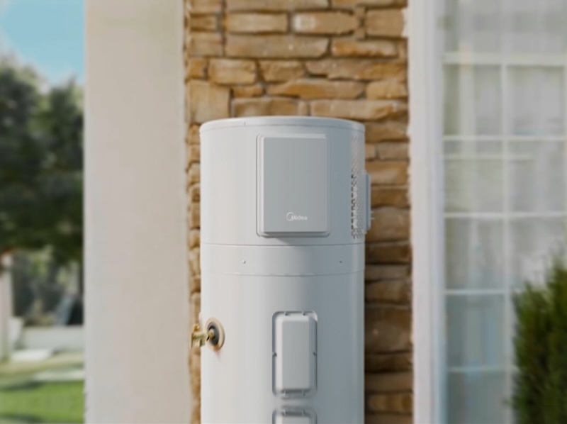 Midea Hot Water Heat Pump next to a house