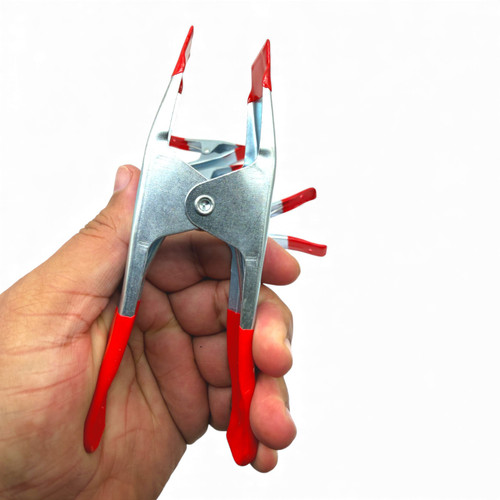 Pack of 4 Large Metal Spring Clamps for Market Stalls, product shown against a coloured background, brightly lit product image