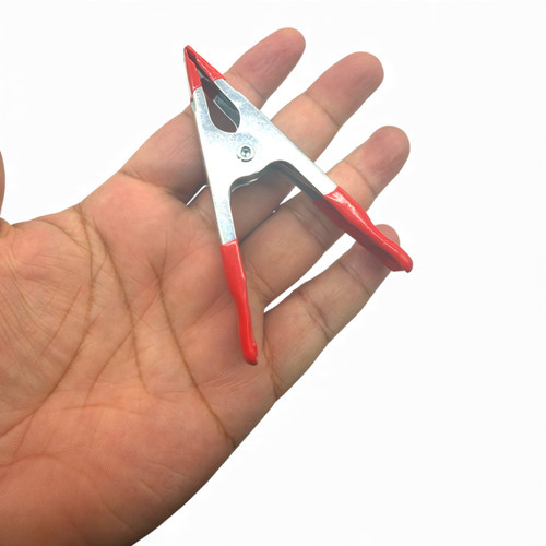 Pack of 4 Large Metal Spring Clamps for Market Stalls, product shown against a coloured background, evenly lit product image