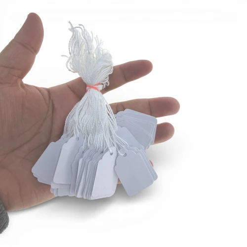 White Strung Parcel Tags with Cotton String, product shown against a light background