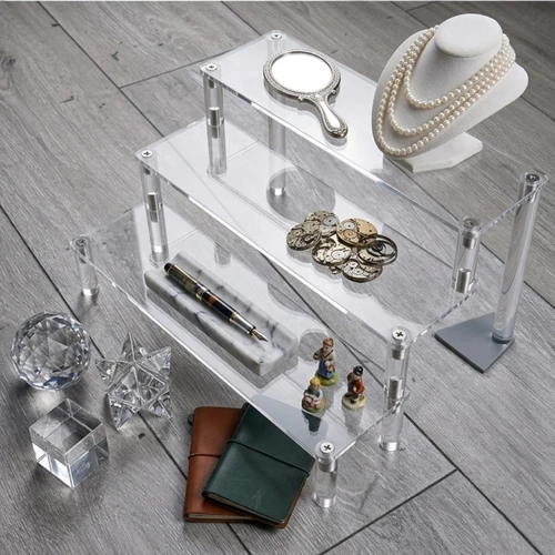 3 Tier Clear Acrylic Display Riser Stand for Jewellery Cosmetics Cupcakes, product shown against a coloured background