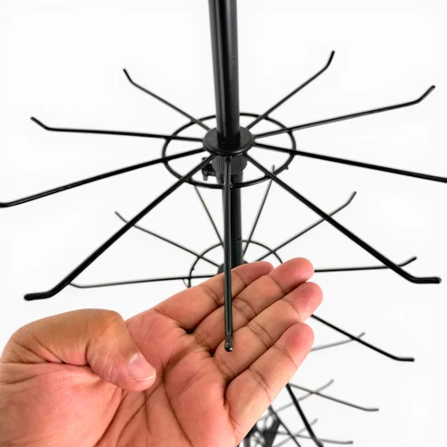 7 Tier Rotating Retail Display Rack with Wheels, Adjustable Black Stand, product shown against a coloured background, standard product photograph