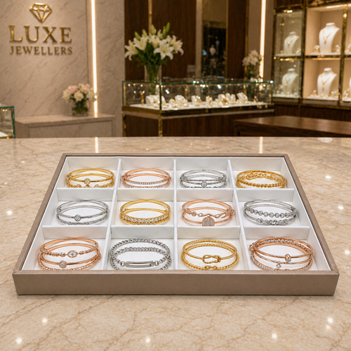 Luxury Rose Gold Bangle Bracelet Organiser Tray With 12 Compartments, product shown against a coloured background