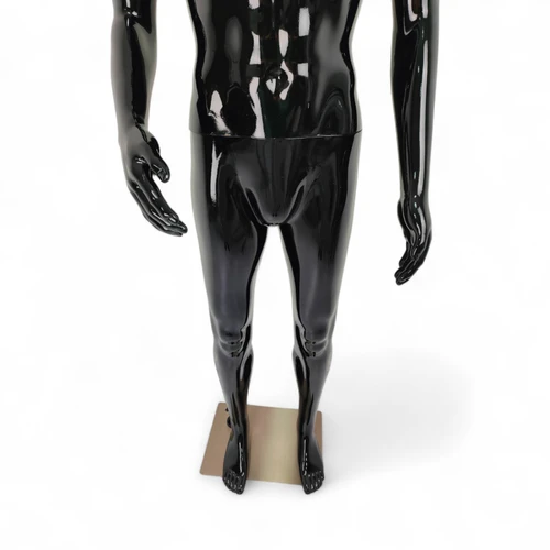 Close-up of the mannequin's legs and rectangular base