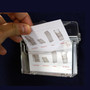 Taymar Clear Outdoor Brochure Holders with Lid, close product view against a dark background