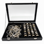 Black Leatherette Glass-Lid Jewelry Box Organizer for Rings, Chains, Earrings, close product view against a coloured background