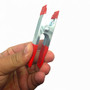Pack of 4 Large Metal Spring Clamps for Market Stalls, product shown against a coloured background, standard product photograph
