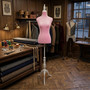 Pink Velvet Female Mannequin Torso Dress Form with Wooden Stand, product shown against a dark background